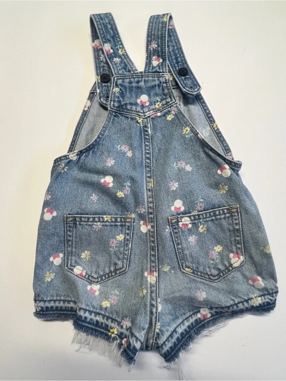 GAP Disney Denim One-Piece Overalls with Pink Bow Accents